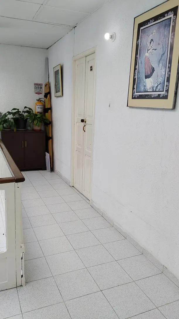 Pasillo de acceso a las habitaciones de Hotel La Margarita